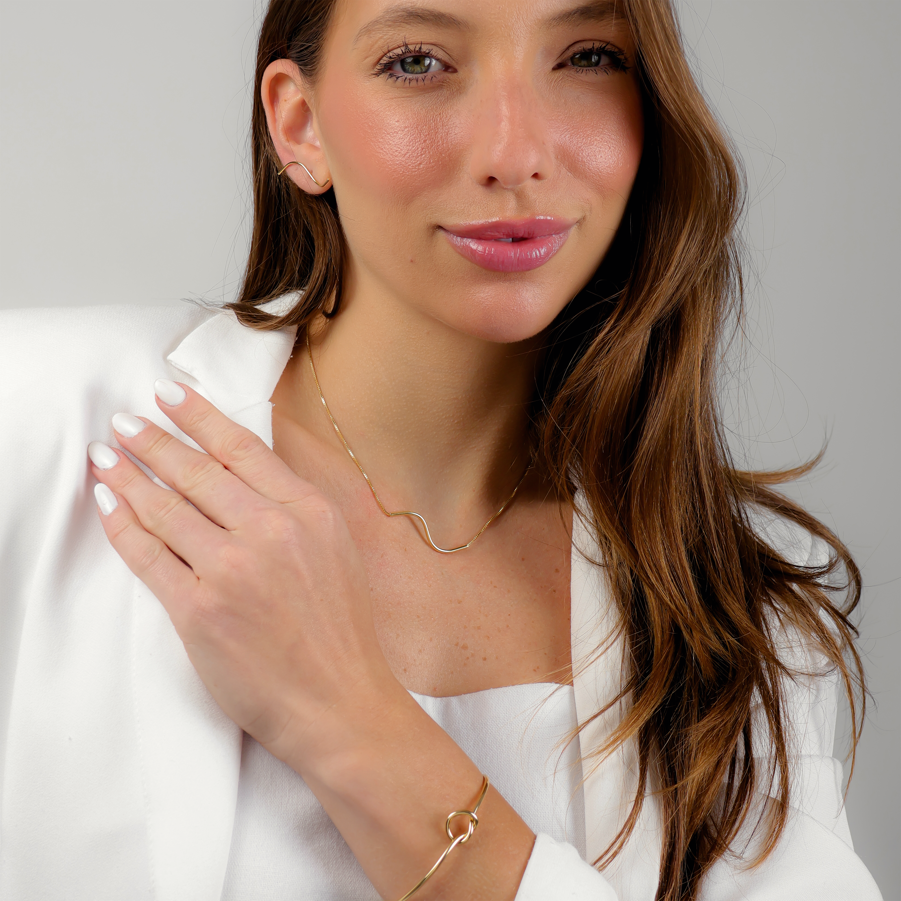 Ghiro Earrings | Gold